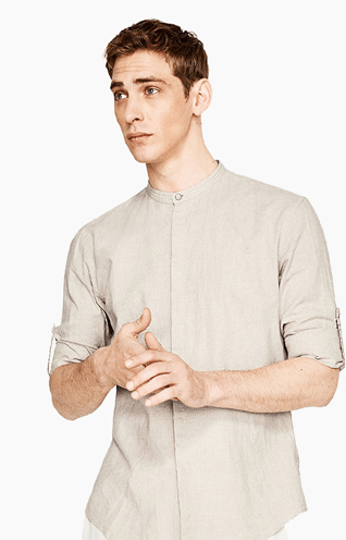 Man in light beige button-up shirt.