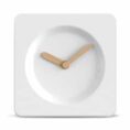 White square clock with wooden hands.