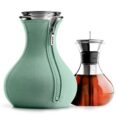 Green carafe and glass tea pot.