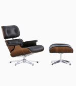 Black leather chair with matching ottoman set.