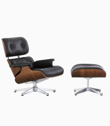 Black leather chair with matching ottoman set.