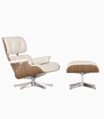 White lounge chair with matching ottoman.