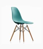 Teal chair with wooden legs, white background.