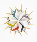 Colorful chairs arranged in a circular pattern.