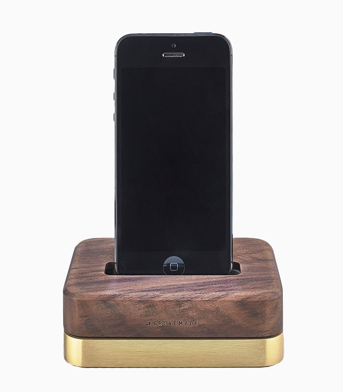 Wooden smartphone dock with brass base.