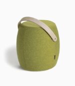 Green fabric stool with wooden handle.
