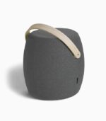 Gray fabric stool with wooden handle.