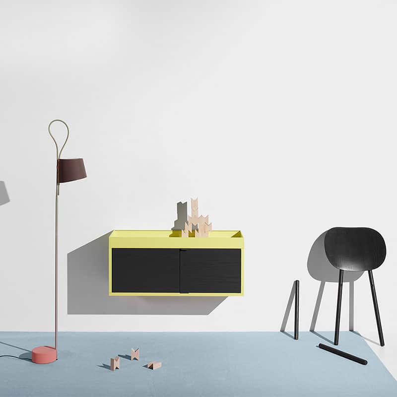 Minimalist furniture against clean, white background.