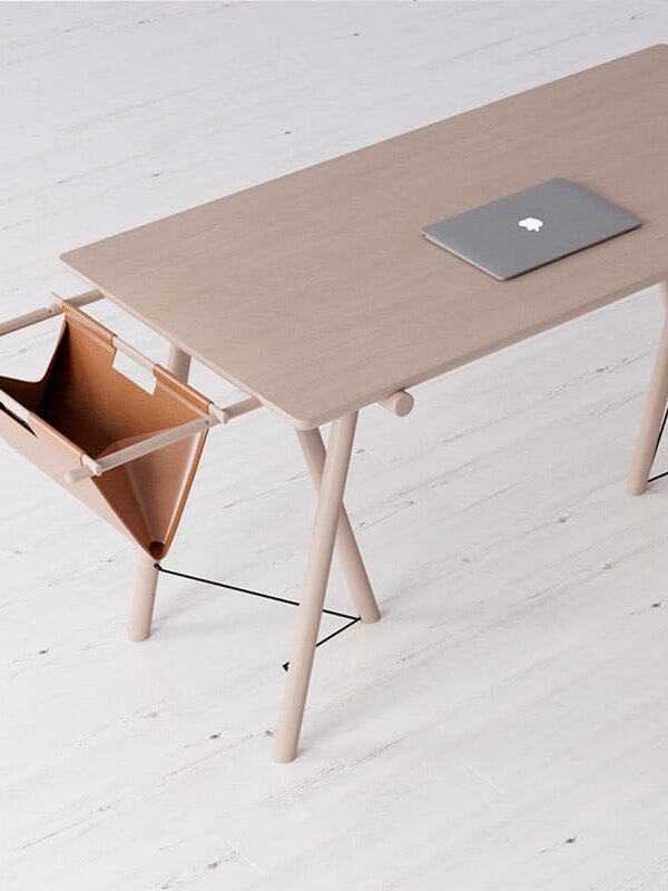 Wooden desk with laptop and storage hammock.