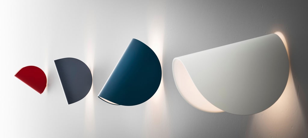 Colorful geometric wall lights in various shapes.