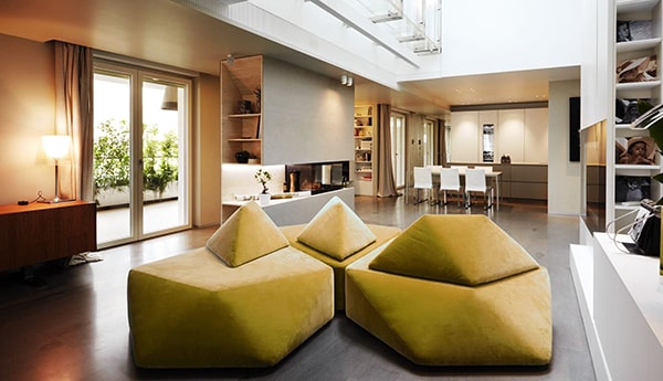 Modern living room with unique yellow furniture.