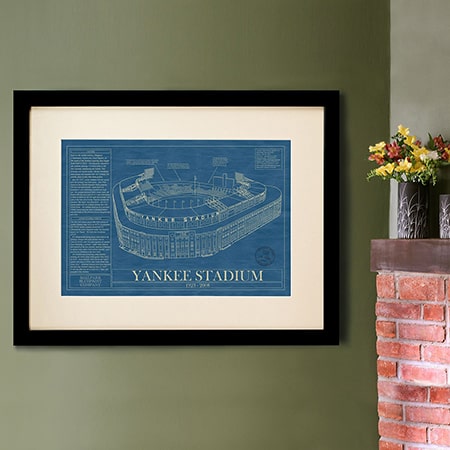 Yankee Stadium blueprint framed on wall.