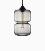 Modern pendant light with glass shade.