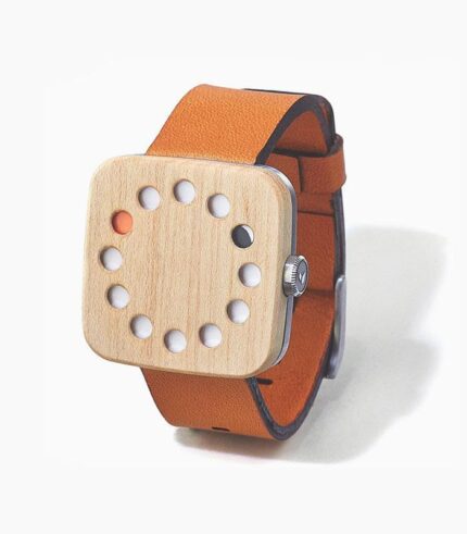Wooden watch with orange leather strap.