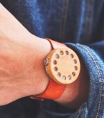 Unique wooden watch with leather strap.