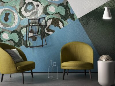 Two chairs with abstract wall art design.