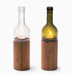 Wine bottle candle holders with wooden base.