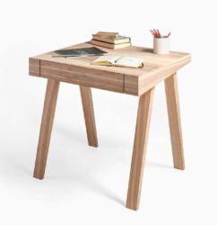 Wooden desk with books and stationery.